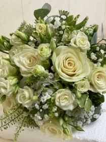 Hand tied bouquet Mixed all white flowers